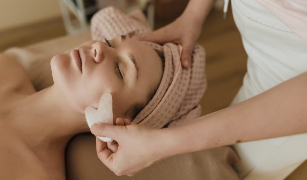 how to do face massage with gua sha
